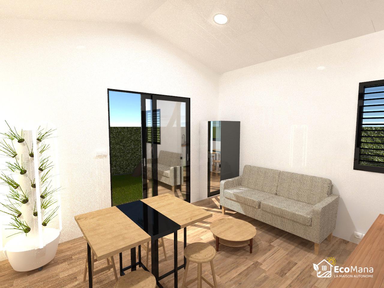 Séjour du bungalow : canapé, table haute, baie vitrée et tour aéroponique